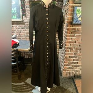 Floor length, black denim duster-dress, silver full-button closure.